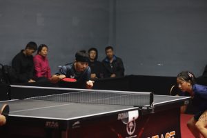 Mizoran duo Jeho Himnakulhpuingheta (blue) and Moumita Saha (blue) in action during a mixed doubles event of the NIAPA Northeast Open Tournament at Chumoukedima.