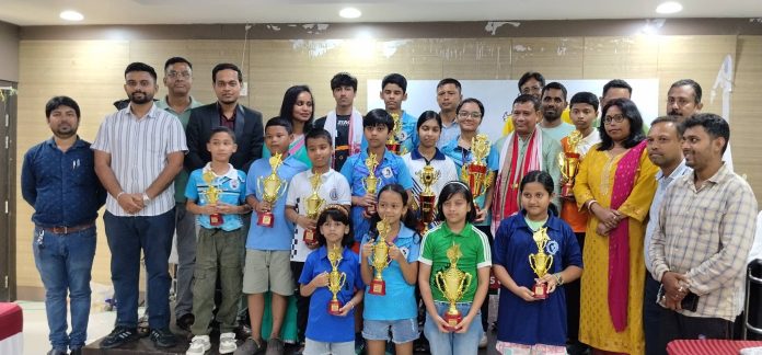 Assam U-15 & U-9 Chess Championship 2026 Concludes in Guwahati Winners, officials, and guests at the prize distribution ceremony of the 49th All Assam U-15 & U-9 Open & Girls Inter-District Chess Championship 2026 held at Sarusajai Sports Complex, Guwahati.