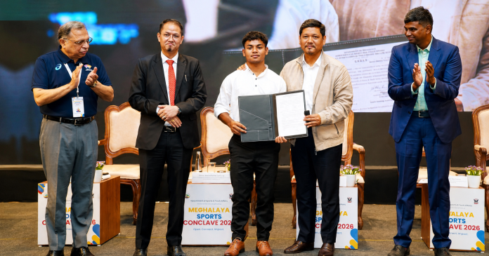 Pynshngain Kurbah receives appointment letter under Meghalaya Outstanding Sportsperson Direct Appointment Policy at Meghalaya Sports Conclave 2026 in Shillong.