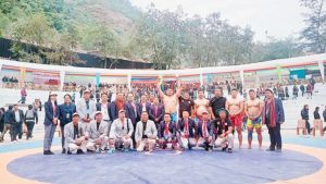 Kezhaseluo-o Pienyü celebrates after winning the 30th NWA Naga Traditional Wrestling Championship in Kohima, Nagaland.
